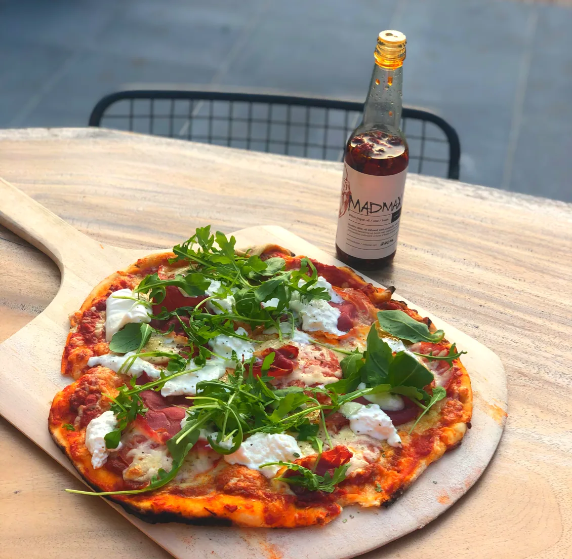 Pizza pique pique chique with burrata and arugula